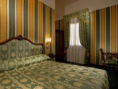 Letto o letti in una camera di Centauro Hotel