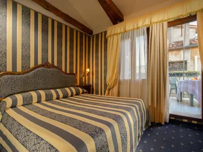 Letto o letti in una camera di Centauro Hotel