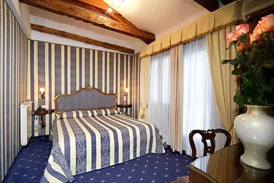 Letto o letti in una camera di Centauro Hotel