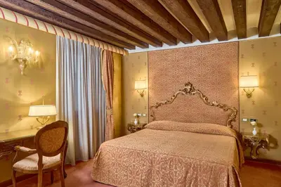 Letto o letti in una camera di Locanda Vivaldi