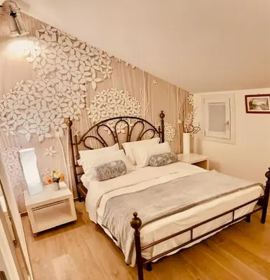 Letto o letti in una camera di Ca’ Francesco appartamenti incantevoli di nuova ristrutturazione