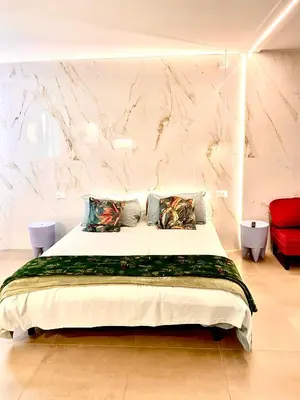 Letto o letti in una camera di Ca’ Francesco appartamenti incantevoli di nuova ristrutturazione