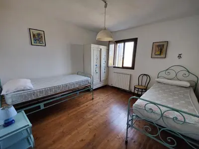 Letto o letti in una camera di Ca degli Aironi