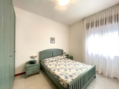 Letto o letti in una camera di Emily - Carraro Immobiliare - Family Apartments