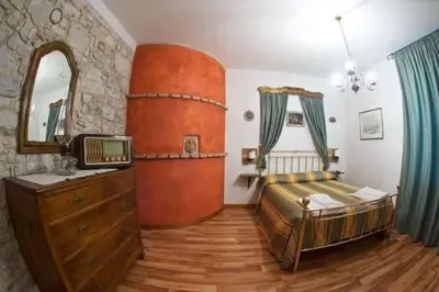 Letto o letti in una camera di Le Perine