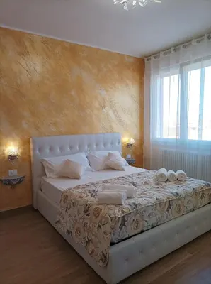Letto o letti in una camera di Casa Micaela