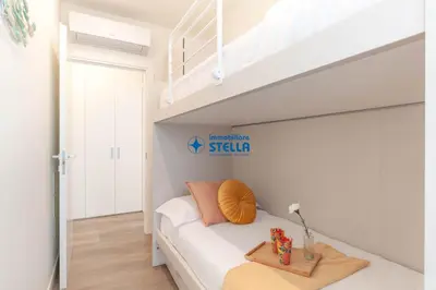 Letto o letti in una camera di Laguna Park