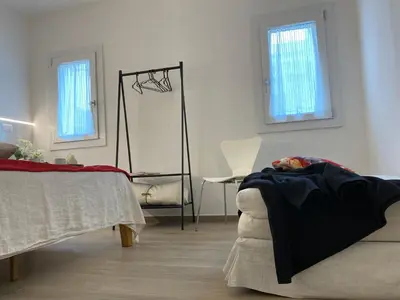 Letto o letti in una camera di Appartamento vintage