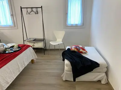 Letto o letti in una camera di Appartamento vintage