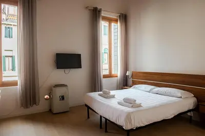 Letto o letti in una camera di Allo Squero