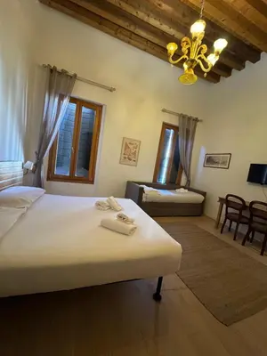 Letto o letti in una camera di Allo Squero