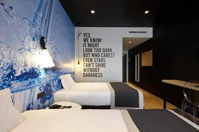 Letto o letti in una camera di Hotel Aqua