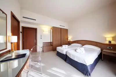 Letto o letti in una camera di Hotel Aqua