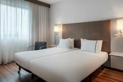Letto o letti in una camera di AC Hotel Padova by Marriott