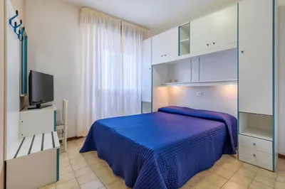 Letto o letti in una camera di Hotel Sanremo