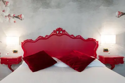 Letto o letti in una camera di Villa Gasparini
