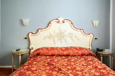 Letto o letti in una camera di Hotel Riviera Venezia Lido
