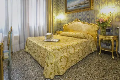 Letto o letti in una camera di Hotel Noemi