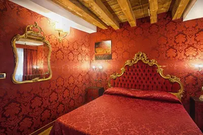 Letto o letti in una camera di Hotel Noemi