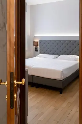 Letto o letti in una camera di Park Hotel Villa Giustinian