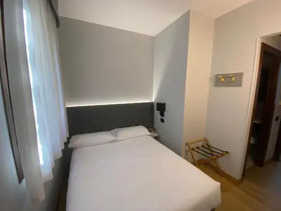 Letto o letti in una camera di Park Hotel Villa Giustinian