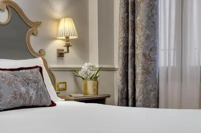 Letto o letti in una camera di Hotel Nuovo Teson