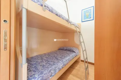 Letto o letti in una camera di Residence Solmare Immobiliare Pacella