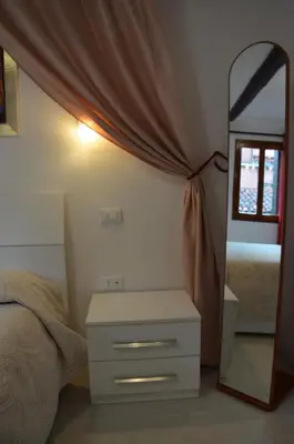 Letto o letti in una camera di Casa di Sam, Venice
