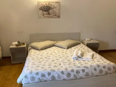 Letto o letti in una camera di Agriturismo Da Andreina