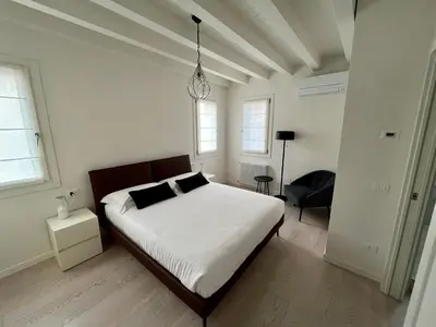 Letto o letti in una camera di Alla Torre 735 - Stay Local Burano