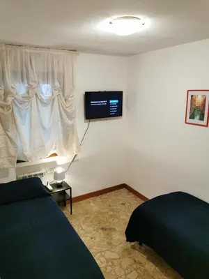 Letto o letti in una camera di Ca' ARCANGELO center Venezia WI-FI Fibre