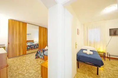 Letto o letti in una camera di Ca' ARCANGELO center Venezia WI-FI Fibre