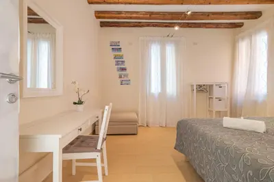 Letto o letti in una camera di Casa Masa close to @S.Lucia Train Station