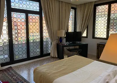 Letto o letti in una camera di Ca' Nigra Lagoon Resort