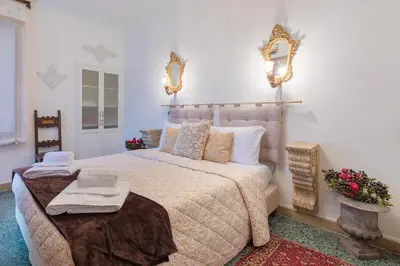 Letto o letti in una camera di Hotel Mezzo Pozzo