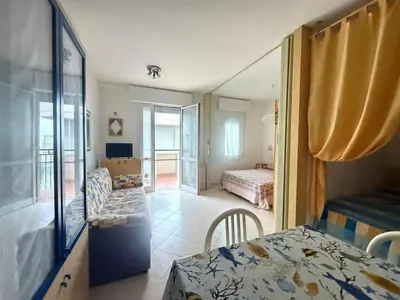 Letto o letti in una camera di Condominio Playa-SOLO PER FAMIGLIE-Walterigato Apartments