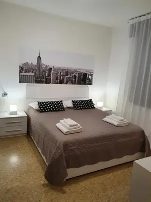 Letto o letti in una camera di 12 minuti da Venezia appartamento con parcheggio