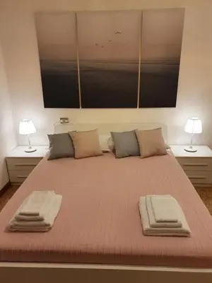 Letto o letti in una camera di 12 minuti da Venezia appartamento con parcheggio