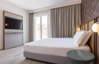 Letto o letti in una camera di Hotel Diana