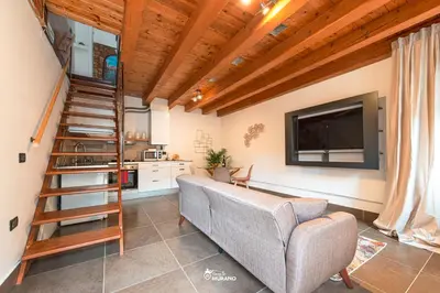 Area soggiorno di RIVA House by Sleep in MURANO