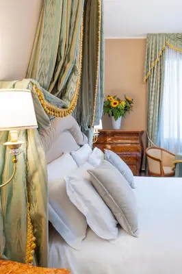Letto o letti in una camera di Hotel Al Ponte Dei Sospiri