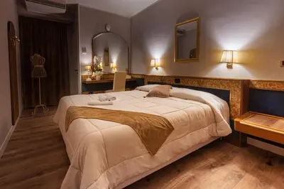 Letto o letti in una camera di Hotel Villa Pigalle