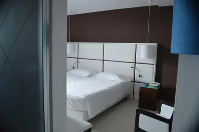 Letto o letti in una camera di Hotel Sagittario