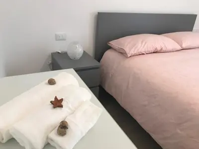 Letto o letti in una camera di Chioggia House di Davide