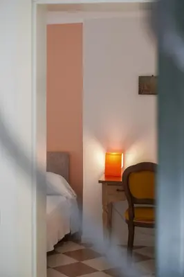 Letto o letti in una camera di Melusina Homes Venice Historical Center