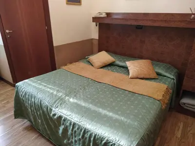 Letto o letti in una camera di Atlantide Hotel