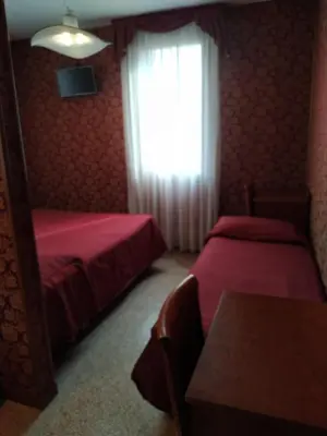 Letto o letti in una camera di Atlantide Hotel