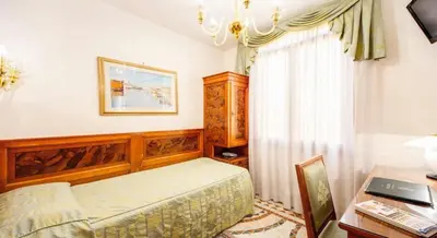 Letto o letti in una camera di Antica Casa Carettoni