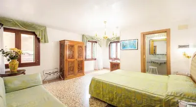 Letto o letti in una camera di Antica Casa Carettoni
