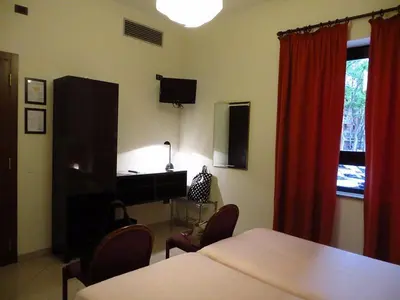 Letto o letti in una camera di Hotel Adria